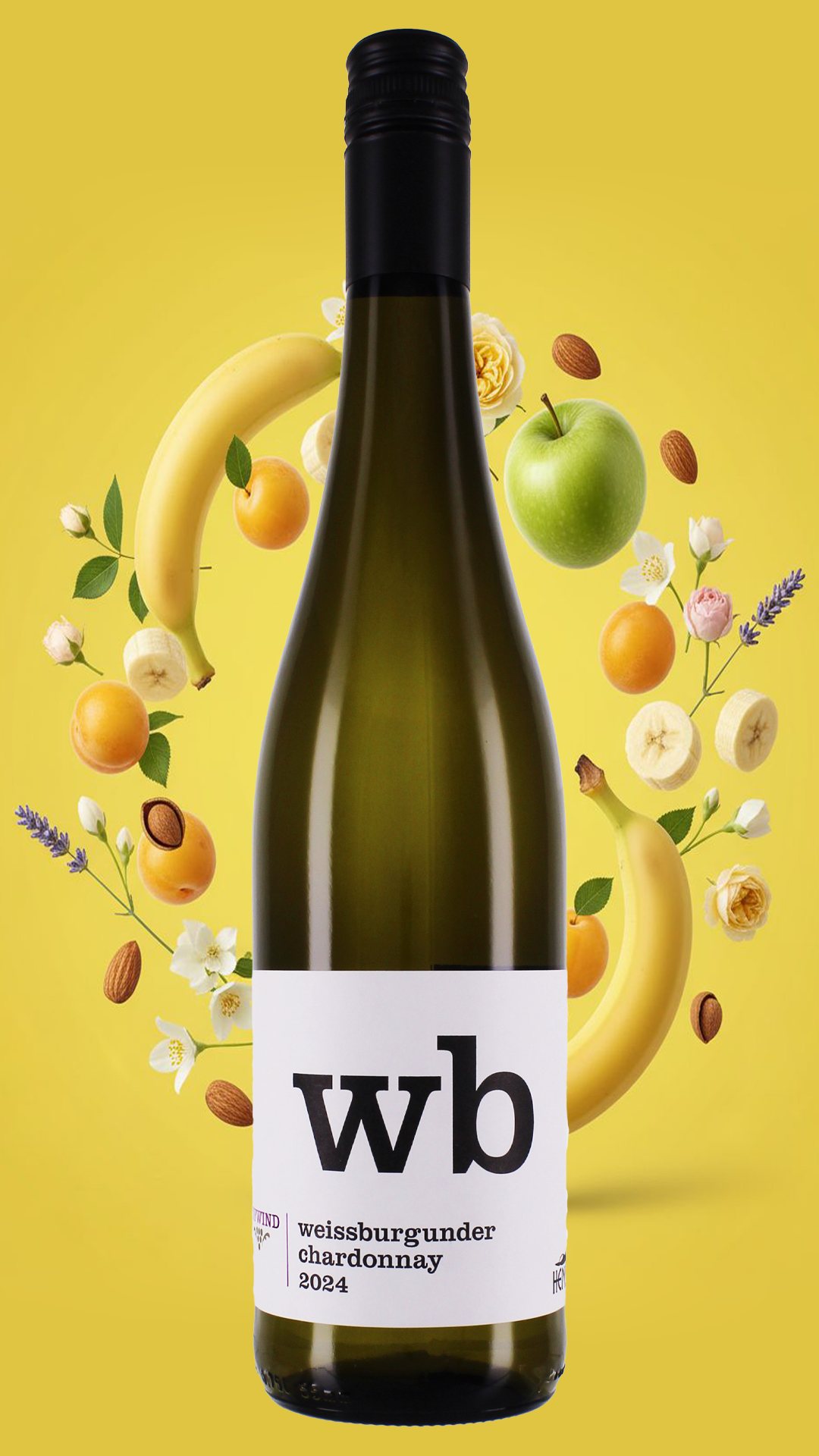 Flasche Hensel Aufwind Weissburgunder und Chardonnay, umgeben von Apfel, Banane, Mirabelle und Mandel